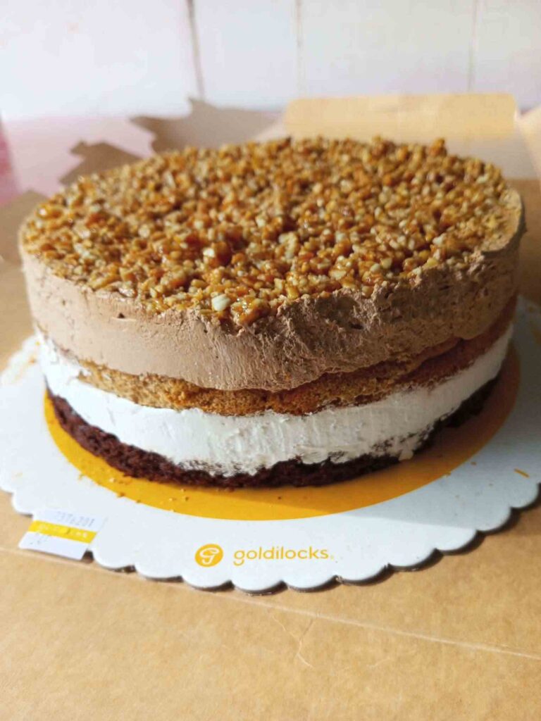 Whole cake from Goldilocks called Coffee Layered Crunch.
