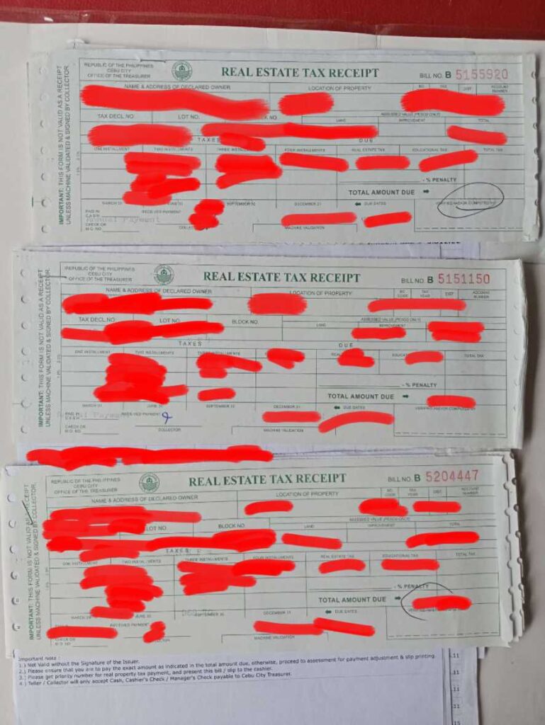 A close-up photo of three Real Estate Tax Receipts. Sensitive information, such as names and addresses, has been redacted. The receipts show details like bill numbers, tax amounts, and due dates. The receipts appear to be official government documents.